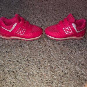 Hot Pink New Balance Sneakers.